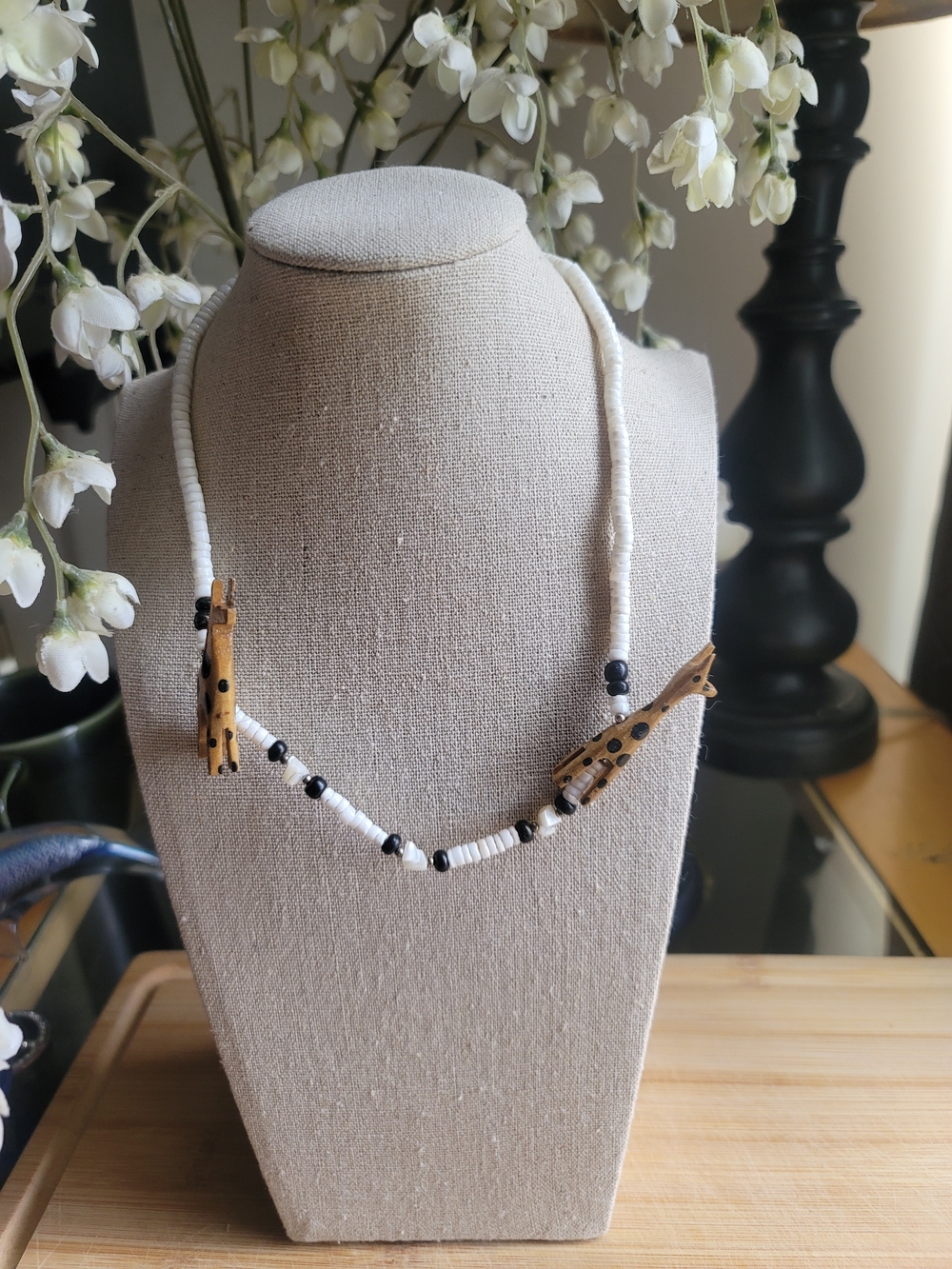 Handcrafted Puka-style White Bead  Necklace with Wooden Giraffe Accents